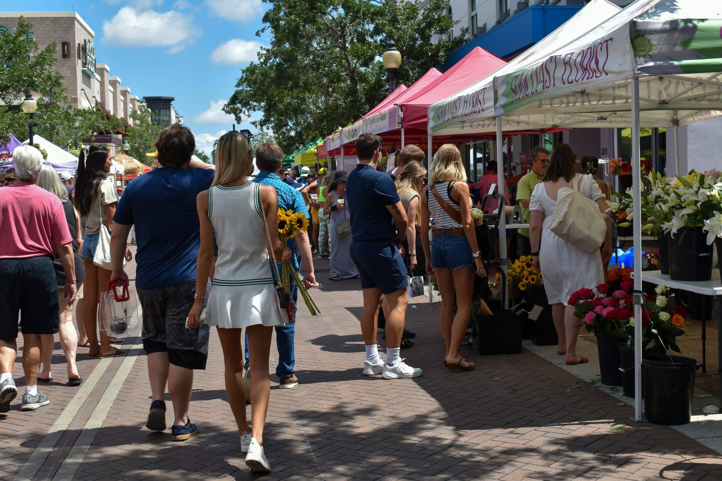 People enjoying a farmer’s marketPeople enjoying a farmer’s market