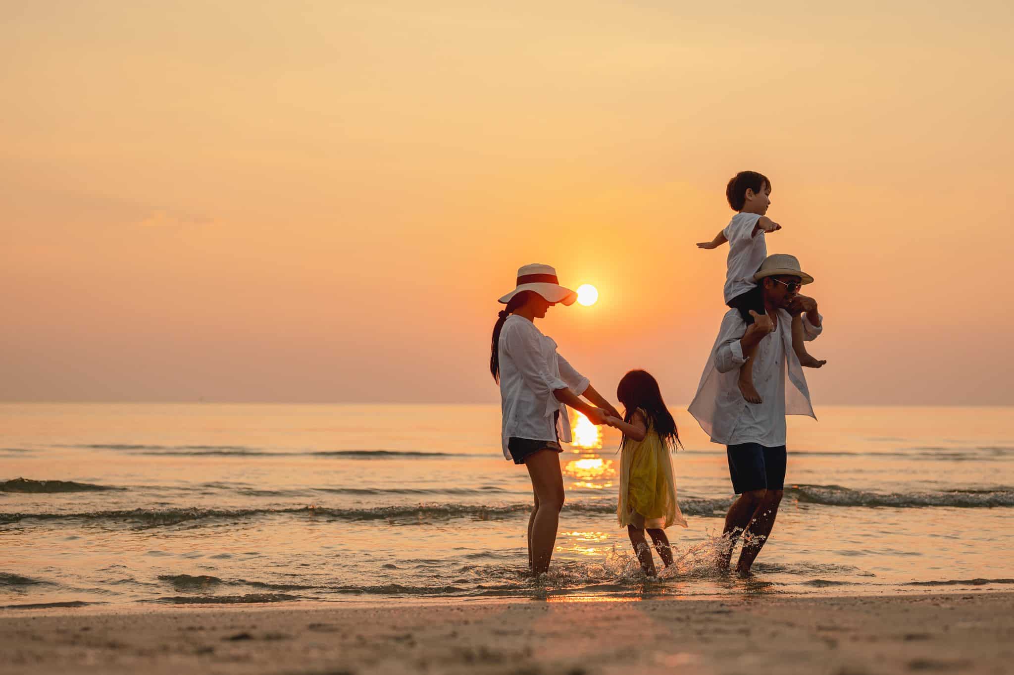 Family enjoying New York suburbs on the beach Family enjoying New York suburbs on the beach