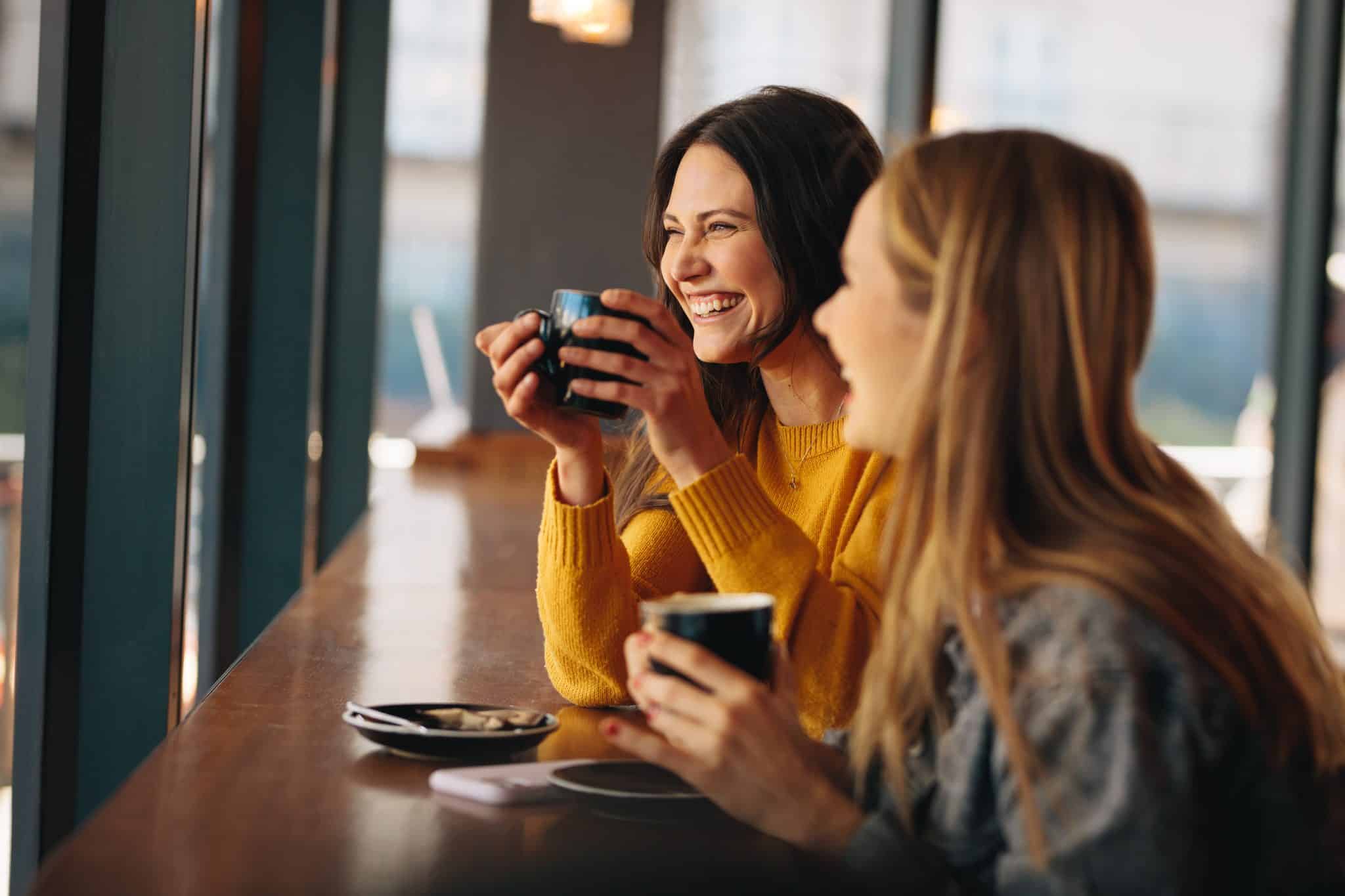 Friends having great time at a coffee shop