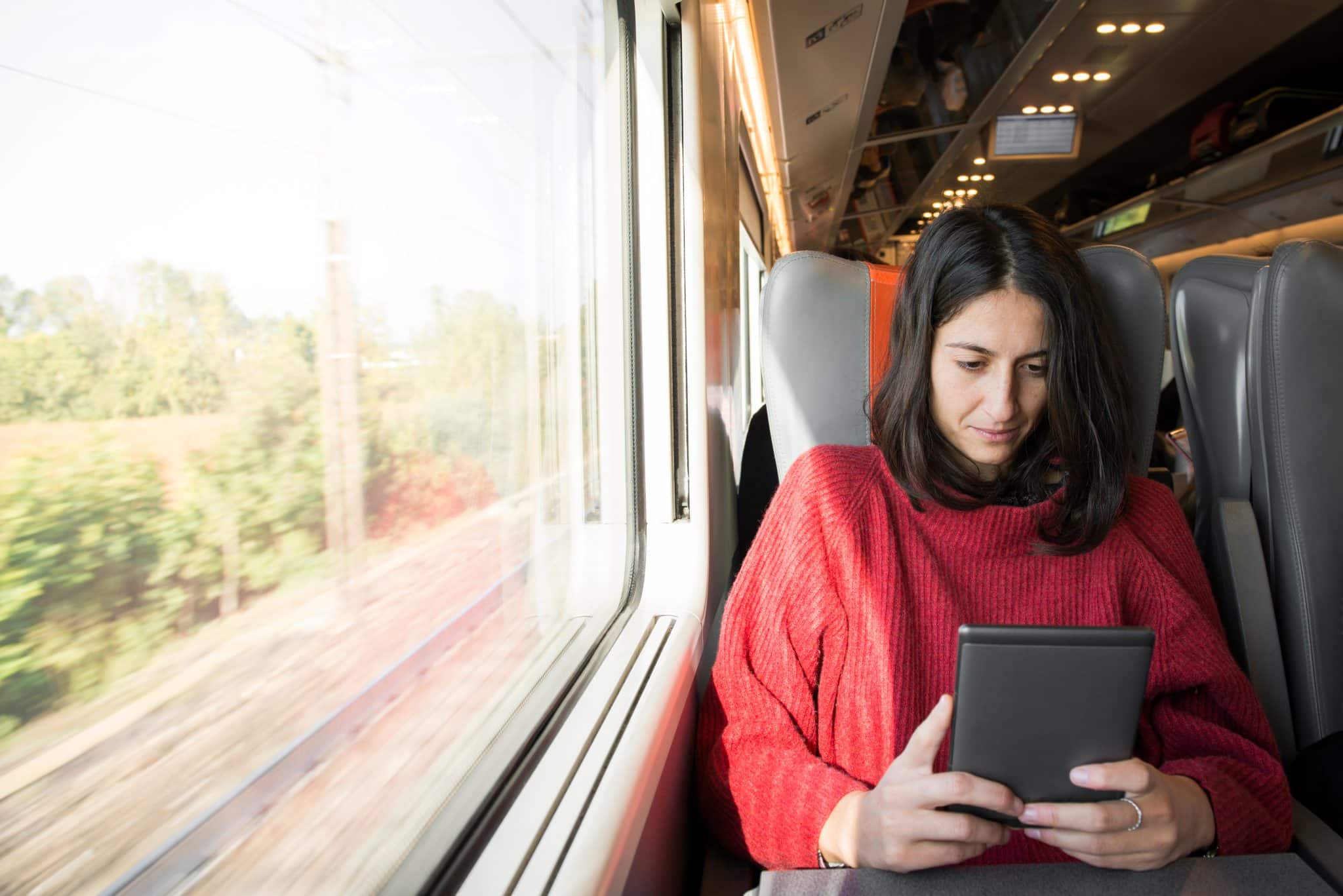 Woman on train commuting from Connecticut Woman on train commuting from Connecticut
