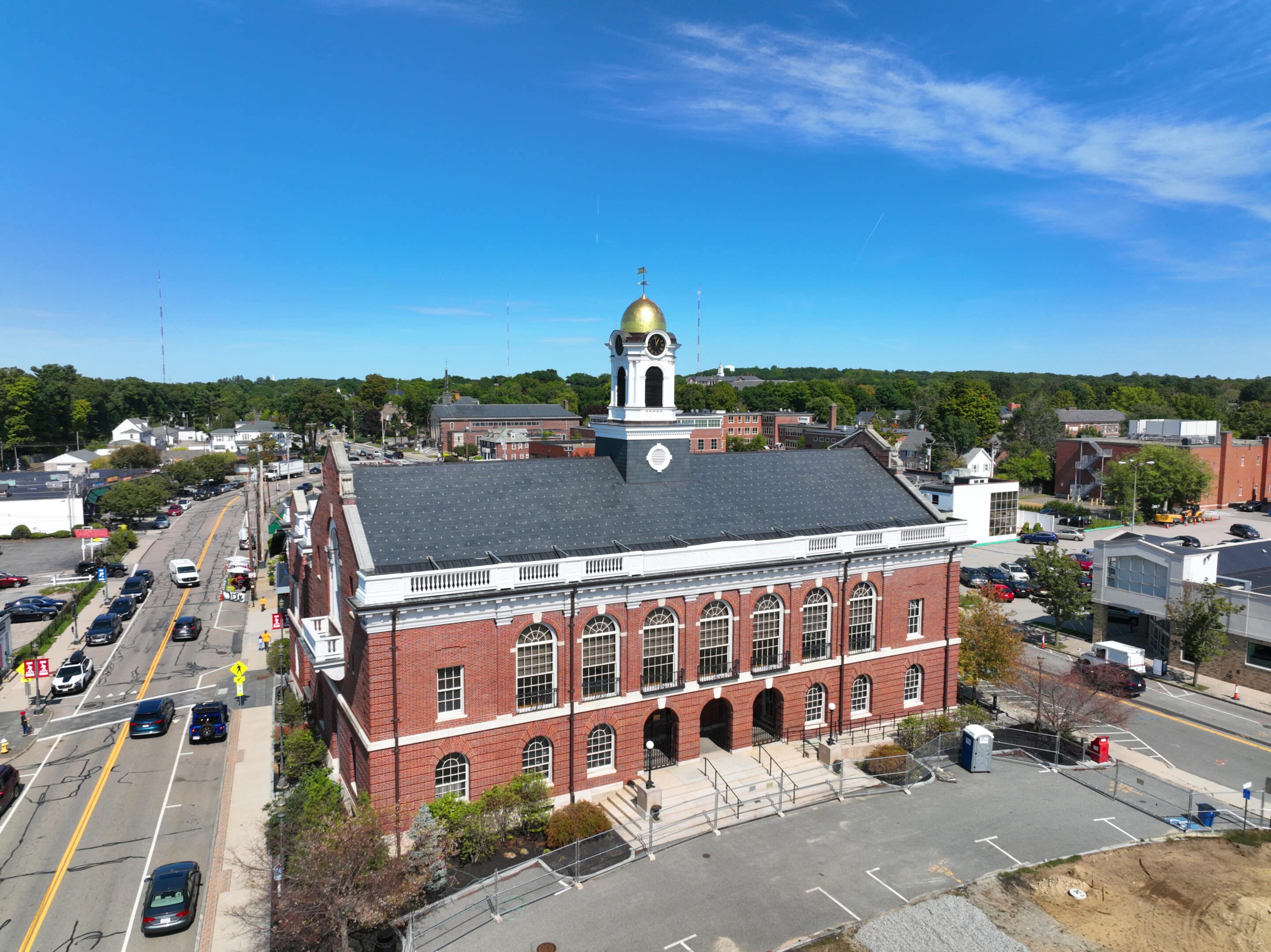 Needham MA Town Hall – Aerial View Aerial view of Needham Town Hall in Needham, Massachusetts, on a clear sunny day
