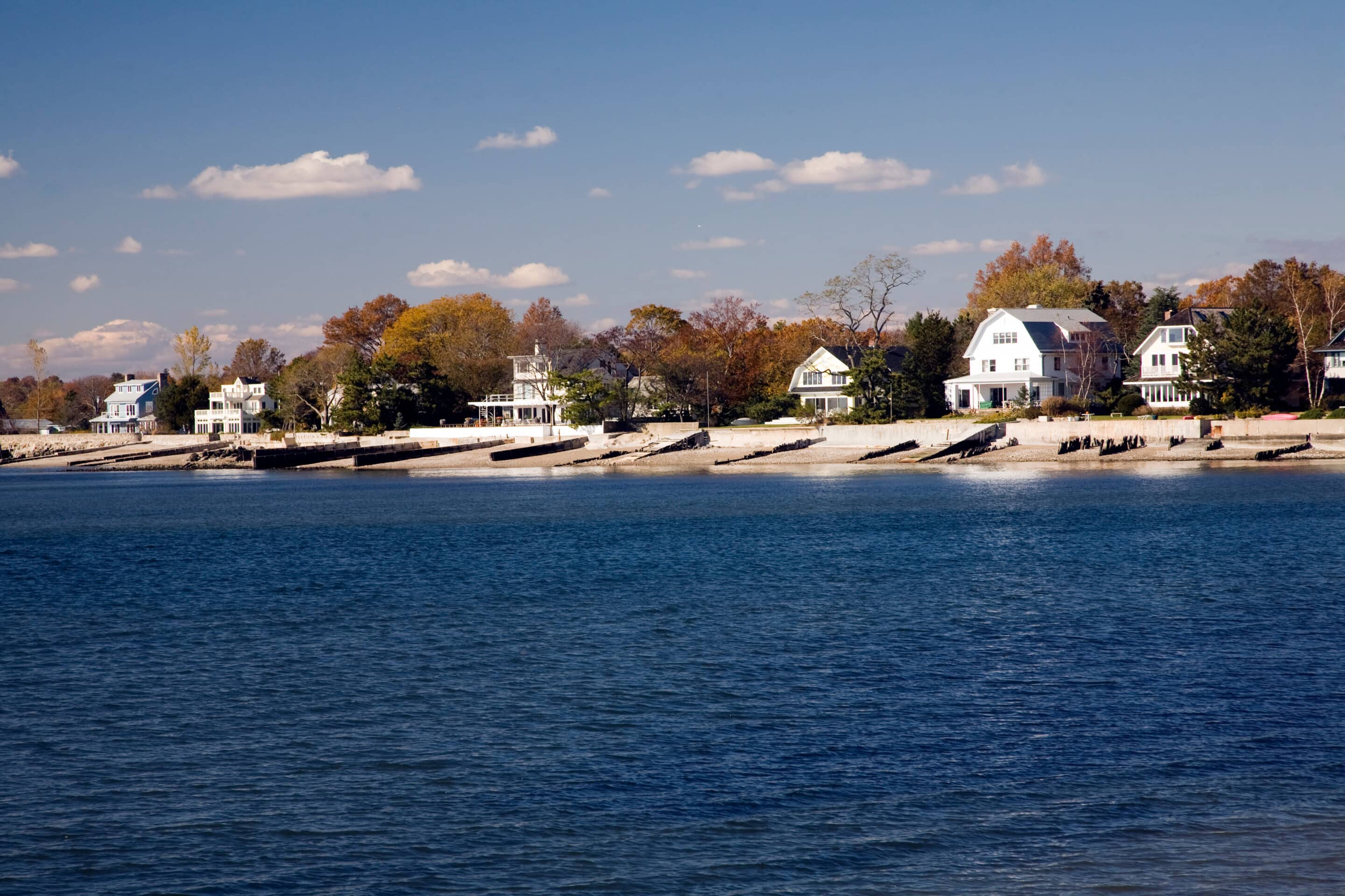 Houses by the sea near Compo Beach, CT, USA Waterfront homes along the Long Island Sound in Westport, Connecticut on a sunny day